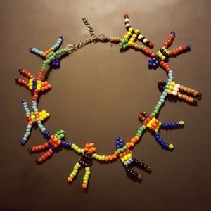 Handmade necklace by Watoto mother